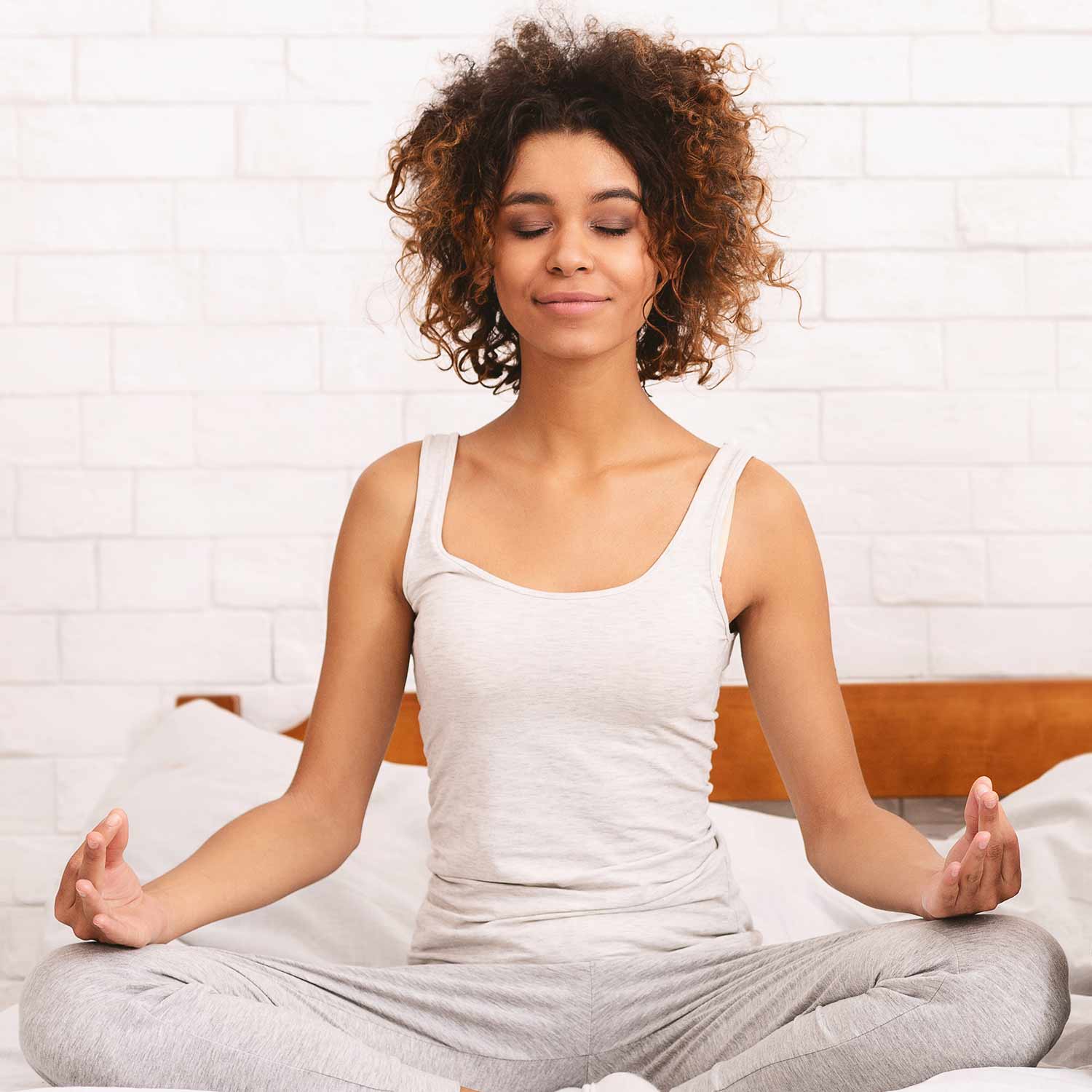 woman doing yoga calmly
